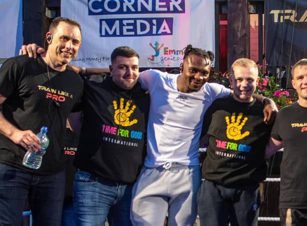 Linus Udofia (centre, in white) - pictured last year at a Pegasus charity event - was beaten in his British Middleweight title fight on a split decision