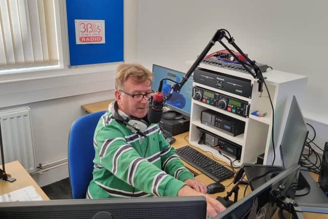 Dave Watts, programme controller at 3Bs Radio, puts in a shift behind the mic