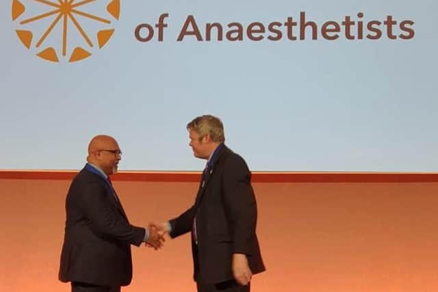 Dr Kumar Krishna Panikkar receives the Evelyn Baker Award from the Association of Anaesthetists