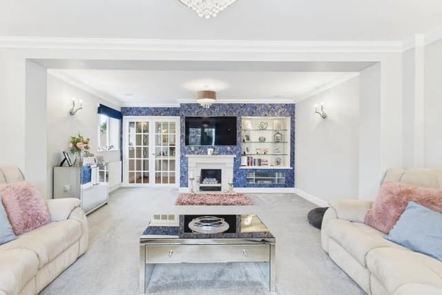 George David says, "The family room provides a versatile space perfect for relaxation, play or work."
