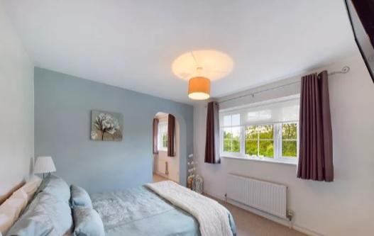 One of four bedrooms in the home, estate agents say the upstairs could be converted into a fifth one.