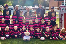 Aylesbury Rugby Club Under 8's team wearing kit donated by Cala Homes