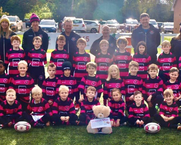 Aylesbury Rugby Club Under 8's team wearing kit donated by Cala Homes