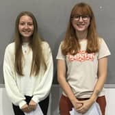 Lottie (L) and Maria (R) collect their results from The Buckingham School