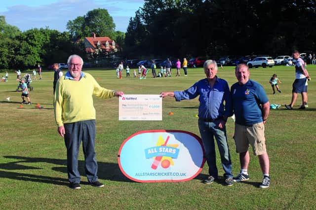 Author, Brian Goodger presents the ‘cheque’ to David Wise, President of Thornborough Cricket Club and Chris Cox, organiser of the All Stars programme at the club.