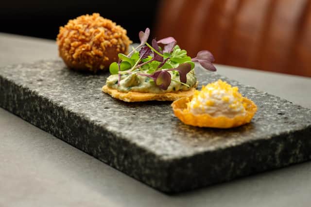 The opening course was a beautifully presented row of canape-style snacks. Image: Rogan & Co