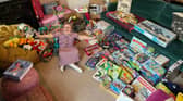 Eloise sorting and packing some of the generous toy donations