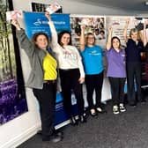 Andrea Smith and Nick Hewer (centre) with representatives from all 12 chosen charities.