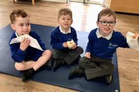 Enjoying delicious doughnuts at Twyford CofE School