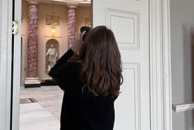 Photographer taking a shot of the Marble Saloon at Stowe House