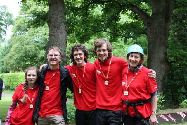 David Blackmore and his wife Rachel with three of their four children after a charity abseil.