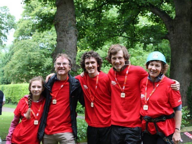 David Blackmore and his wife Rachel with three of their four children after a charity abseil.