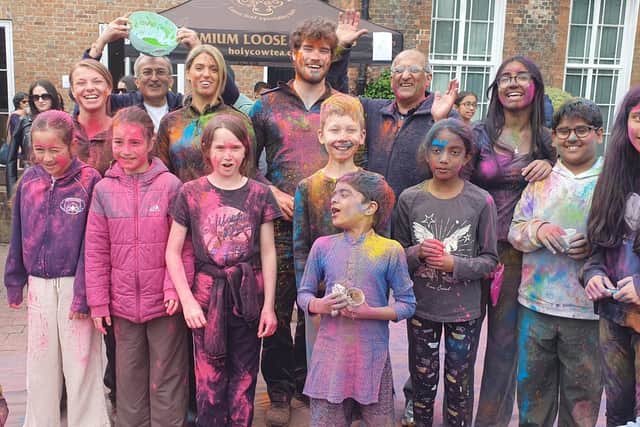 Children celebrating Holi with local PCSOs who were in attendance at the event