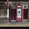 The rare maroon phone box, photo from Historic England Archive
