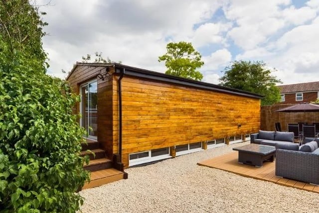 In the garden is a two-storey cabin, which has been maintained to a high livable standard, according to George David.