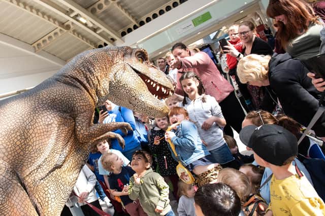 Friars Square Shopping Centre Easter School Holiday dinosaur event - T Rex roams the centre! Photo by Derek Pelling