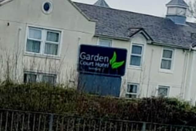 New sign saying Garden Court Hotel
