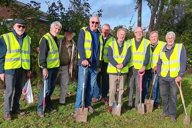 9 members of  Buckingham Rotary