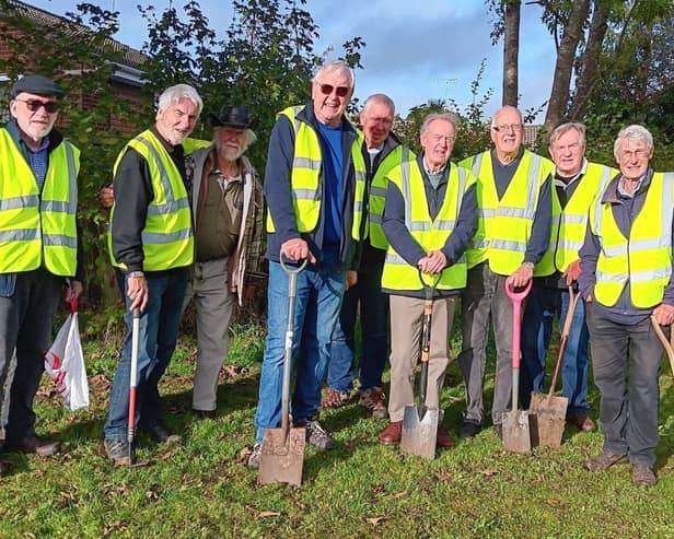 9 members of  Buckingham Rotary
