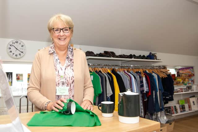 A Florence Nightingale Hospice Charity shop volunteer