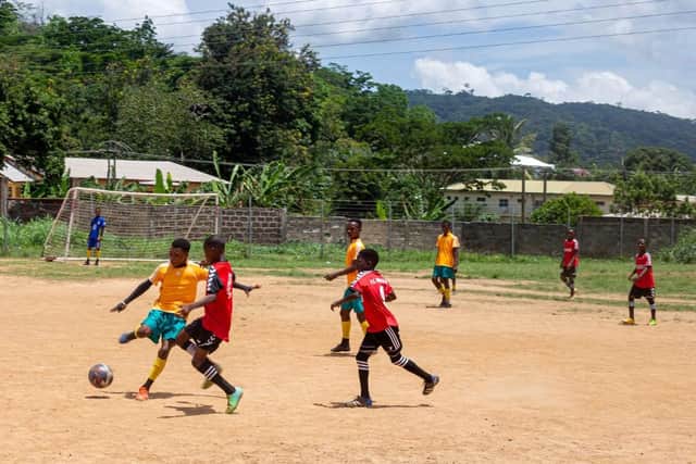 Ghanian street children playing football at the OCSA Youth Football event.