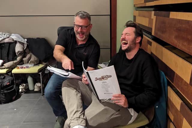 Andy Collins and James Bye learning the script