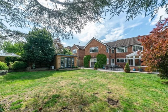 The garden contains a full width sun terrace, and a private area with lawned with raised timber decked seating area and outside lighting.