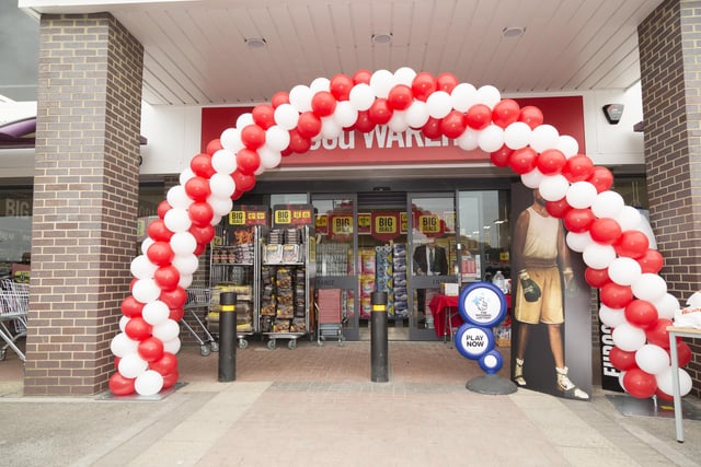 A balloon arch was created to welcome the store's first ever customers.