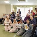 Residents and staff at Juniper House care home enjoy their pyjama day