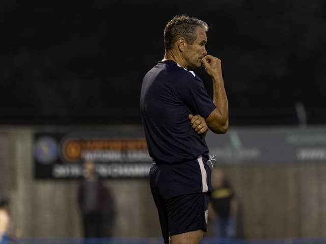Brackley Town boss Kevin Wilkin watches on during his team's 2-1 defeat at King's Lynn Town. Picture by Glenn Alcock