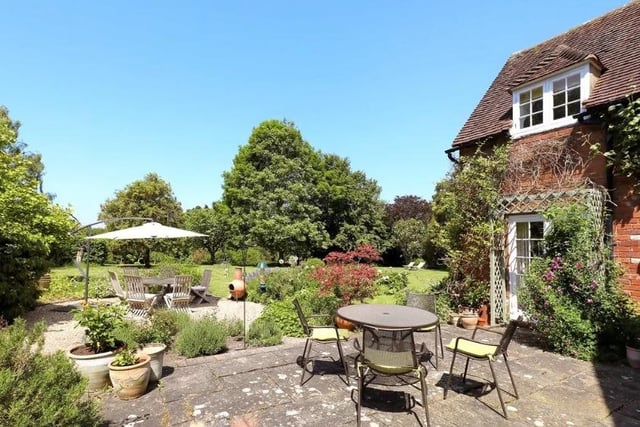 The house is surrounded by a number of expertly maintained gardens.