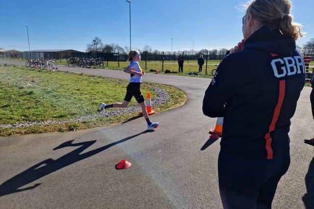 Jodie Swallow, British Triathlon Regional Academy Coach coaching a young female athlete