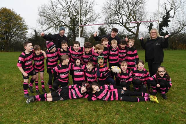 •	The Aylesbury Rugby under 9’s team with coaches Chris and Liam 