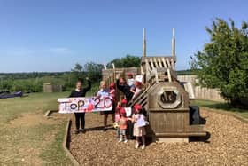 Children and staff celebrating the win at Field House Day Nursery