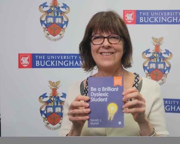 Sarah Myhill with her book