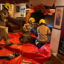 Firefighters worked quickly to prevent a blaze at The Crooked Billet pub in Newton Longville spreading to its thatched roof