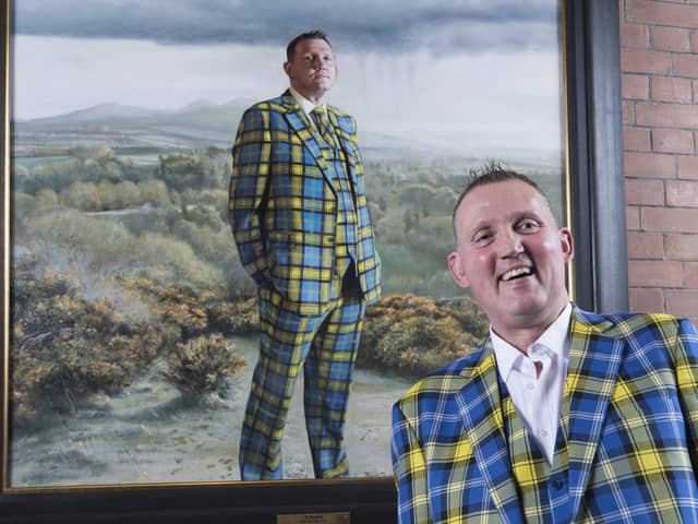 Doddie Weir with his painting in the Scottish National Portrait Gallery (SNPG)