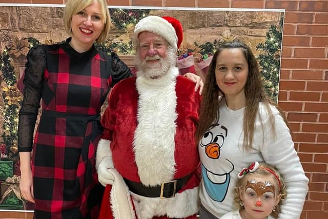 Santa makes an appearance at the Christmas party for Ukrainian guests
