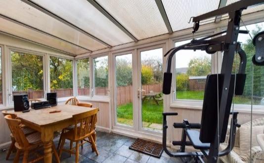 The dining room which is also acting as a workout area.