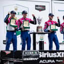 (L-R) Simon Pagenaud, Colin Braun, Tom Blomqvist and Helio Castroneves, drivers of The #60 Meyer Shank Racing w/ Curb-Agajanian Acura ARX-06 celebrate in victory lane after winning the Rolex 24 at Daytona International Speedway on January 29, 2023 in Daytona Beach, Florida. (Photo by James Gilbert/Getty Images)