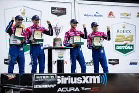 (L-R) Simon Pagenaud, Colin Braun, Tom Blomqvist and Helio Castroneves, drivers of The #60 Meyer Shank Racing w/ Curb-Agajanian Acura ARX-06 celebrate in victory lane after winning the Rolex 24 at Daytona International Speedway on January 29, 2023 in Daytona Beach, Florida. (Photo by James Gilbert/Getty Images)