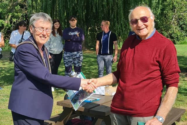 The mayor congratulates Mr Wilkins on his winning garden