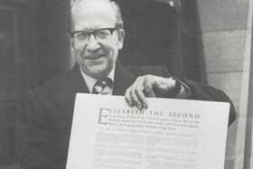 The then vice-chancellor Prof Alan Peacock with the Royal Charter in 1983