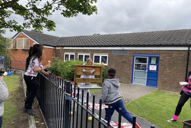 A teacher in the stocks