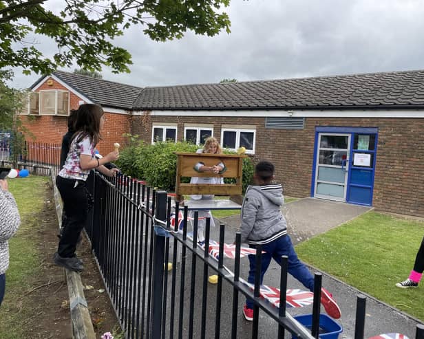 A teacher in the stocks