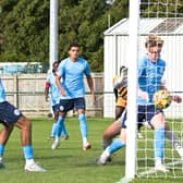 Max Cavana (left) ducks in to head the opening goal at Dunstable. Photo by Mike Snell.