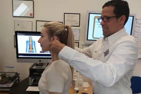 Arthur Tovar, D.C of Thame Chiropractic Clinic conducts a Myovision Scan
