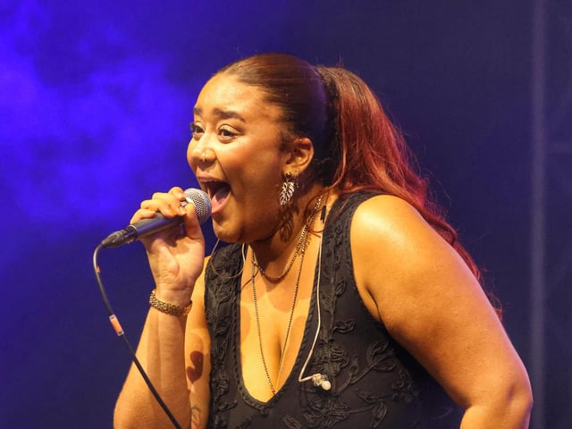 Belting out during the headline set.