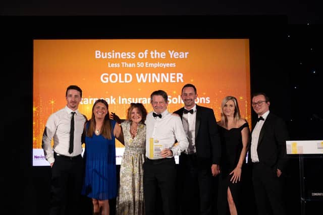 The Starpeak team with their trophy for winning Gold in 'Business of the Year' category