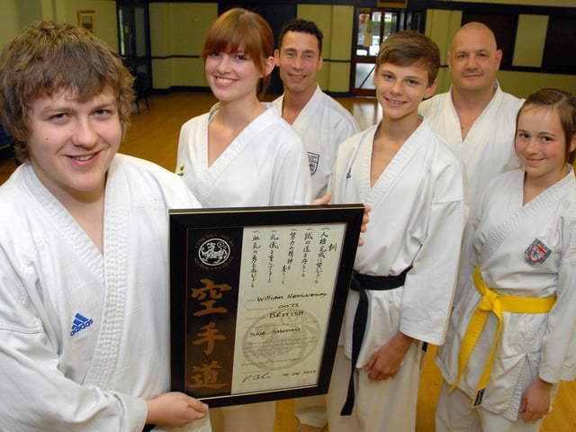 Three members of Ollerton's Shotokan Karate Club recently gained their Black Belts after a grading course. Pictured from left are; William Hemingway Senior Black Belt 1st Dan, Kathryn Faulkner Senior Black Belt 2nd Dan, Chief Instructor, Sensei Paul Jalam, Edward Faulkner Senior Black Belt 1st Dan, Senior Instructor Deano Woodhouse and Rose Hemingway who double graded both Red and Yellow belts.